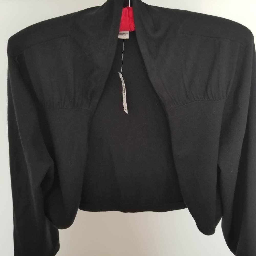New White house /Black market Black shrug Size L.